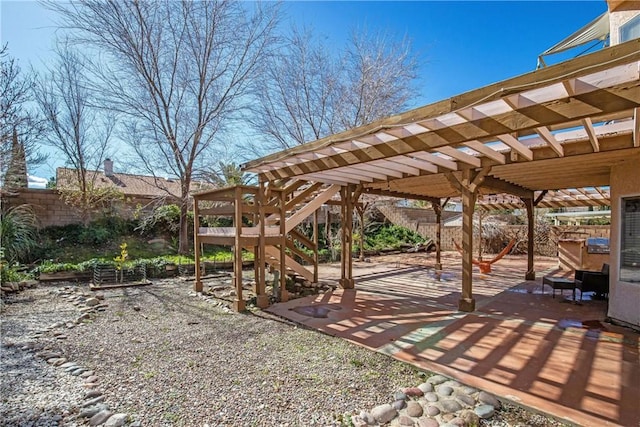 view of patio featuring a pergola