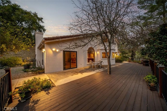 view of deck at dusk