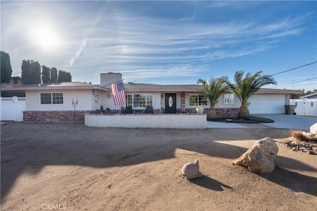 single story home with a garage