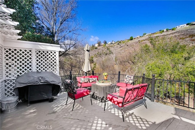 view of patio featuring a grill and an outdoor living space