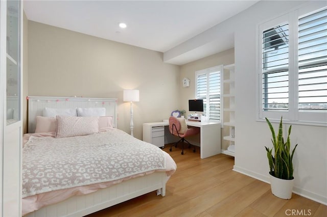 bedroom with light hardwood / wood-style flooring