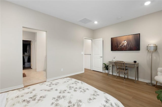 bedroom featuring hardwood / wood-style flooring