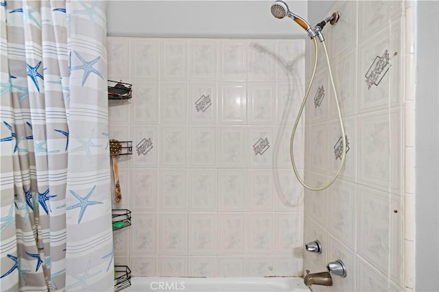 bathroom featuring shower / bath combination with curtain