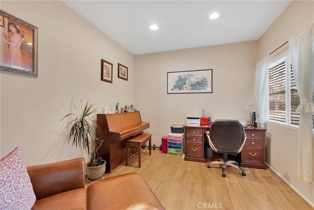 office featuring light wood finished floors and recessed lighting