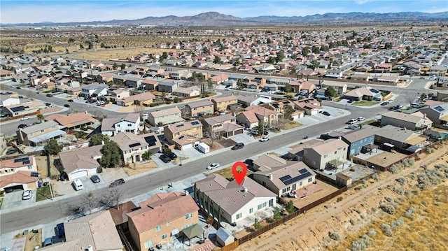 bird's eye view featuring a residential view and a mountain view