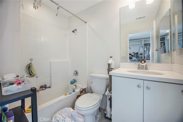 full bathroom featuring vanity, toilet, and washtub / shower combination