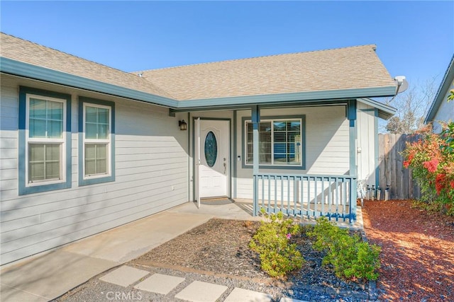 doorway to property with a porch