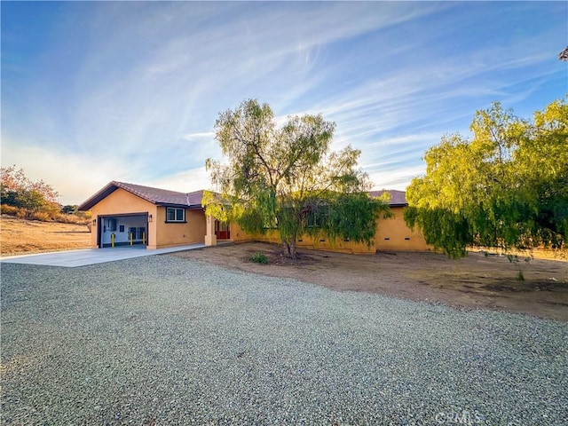 view of front of property with a garage