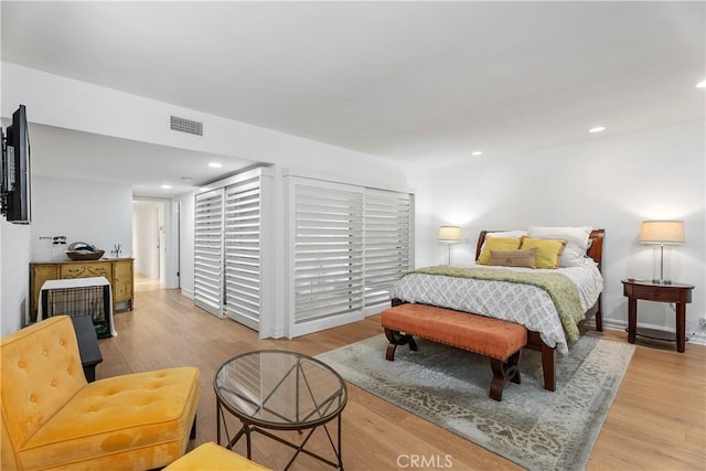 bedroom featuring light hardwood / wood-style floors