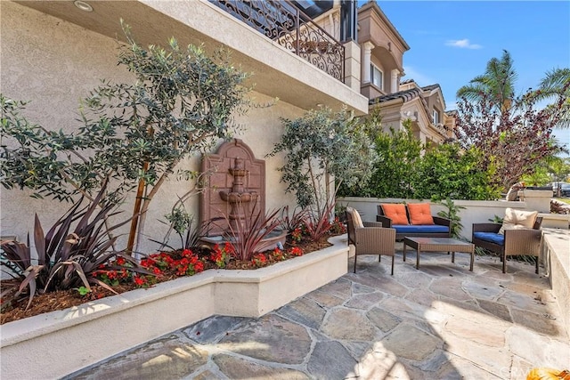 154 12th St, Seal Beach, CA 90740 - view of patio featuring outdoor lounge area and a balcony