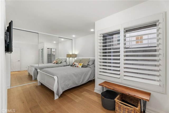 bedroom featuring light wood-type flooring