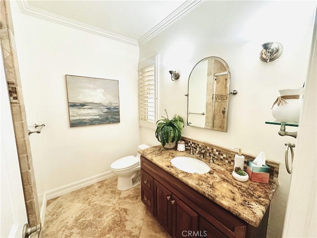 154 12th St, Seal Beach, CA 90740 - bathroom with ornamental molding, toilet, a shower, vanity, and baseboards