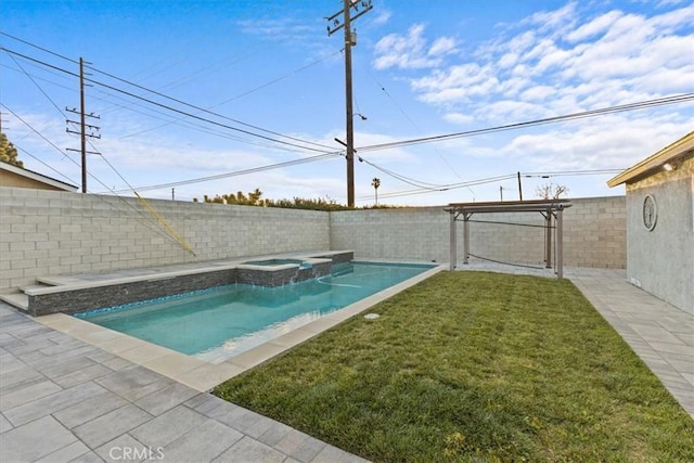 view of swimming pool featuring an in ground hot tub and a lawn