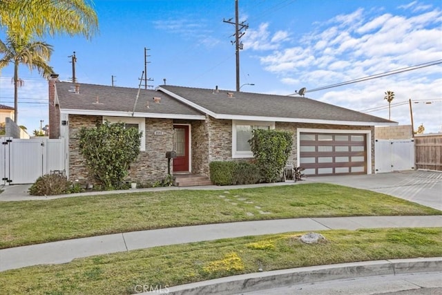 single story home featuring a garage and a front yard