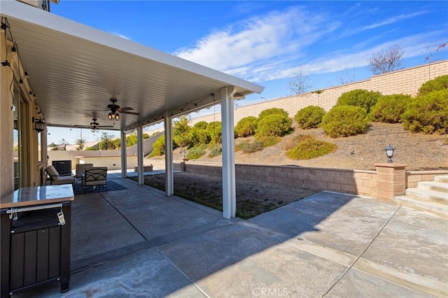 view of patio with ceiling fan