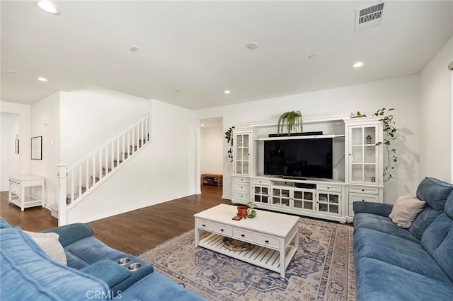 living room with dark hardwood / wood-style floors