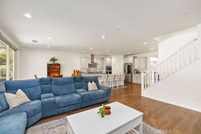 living room with hardwood / wood-style floors