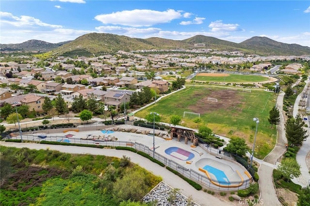 drone / aerial view featuring a mountain view