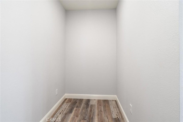 spare room with hardwood / wood-style flooring