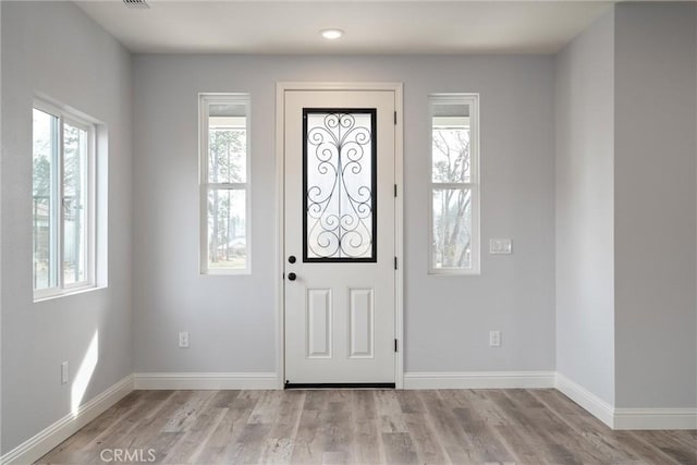 entryway with light wood-type flooring