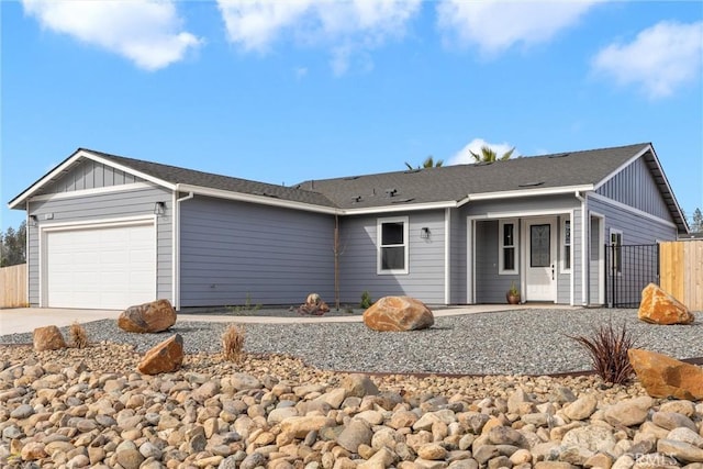 ranch-style house featuring a garage