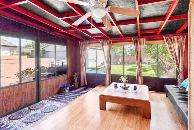 sunroom featuring ceiling fan and coffered ceiling