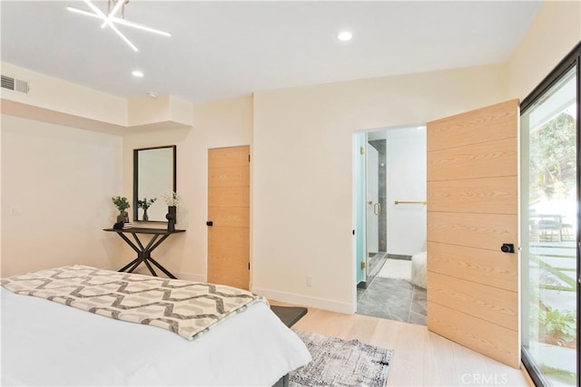 bedroom with light hardwood / wood-style floors