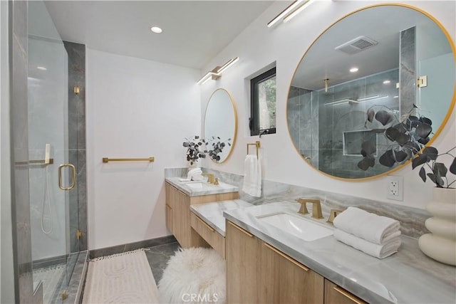 bathroom with vanity and walk in shower