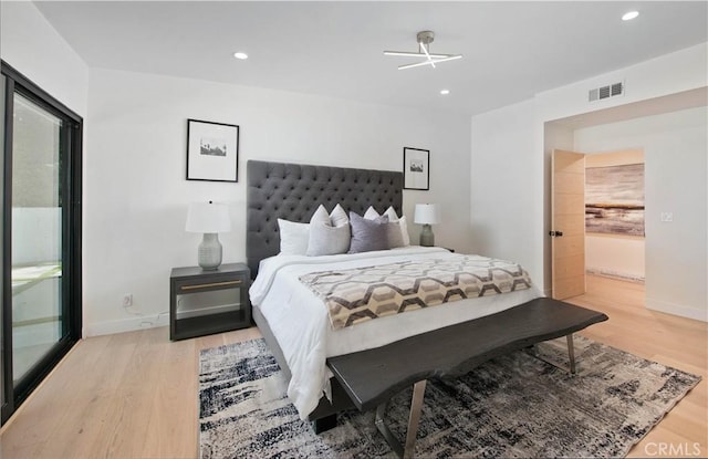 bedroom with light wood-type flooring