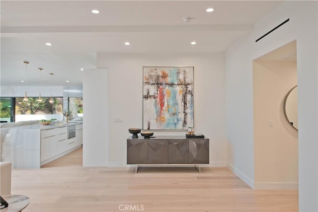 hall featuring light hardwood / wood-style flooring