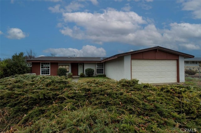 single story home featuring a garage