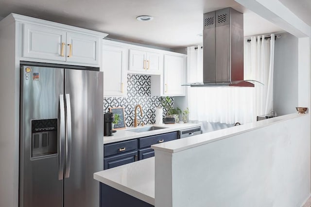 kitchen featuring sink, blue cabinetry, stainless steel appliances, ventilation hood, and white cabinets