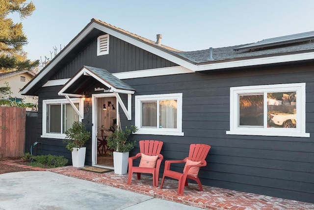 rear view of property featuring a patio