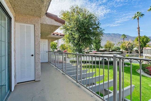 balcony featuring a mountain view