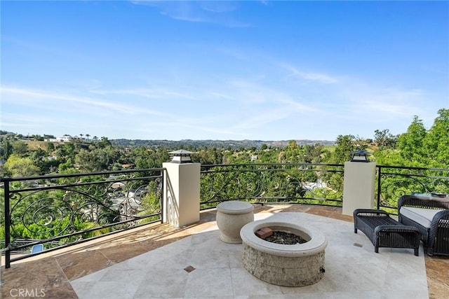view of patio featuring a fire pit
