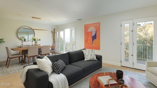 living room with light hardwood / wood-style floors