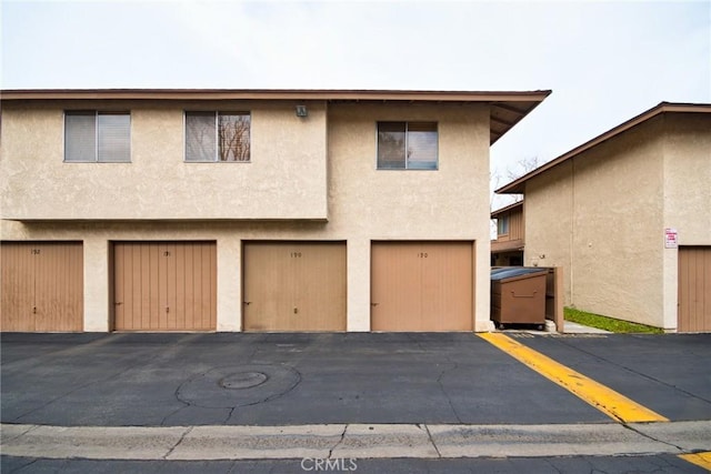 exterior space with a garage