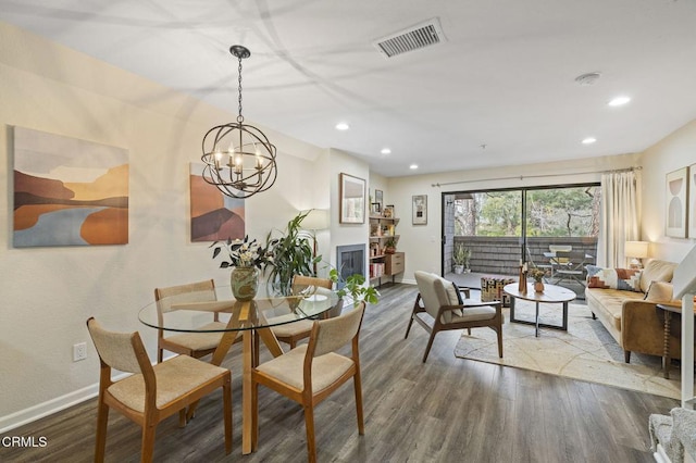 dining space featuring hardwood / wood-style flooring