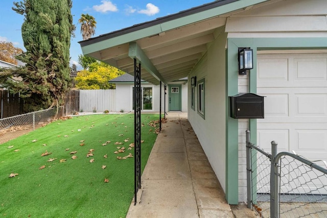 view of yard featuring a garage