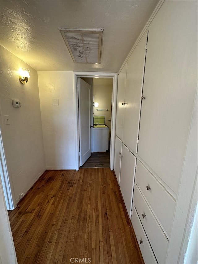 hall featuring dark hardwood / wood-style floors