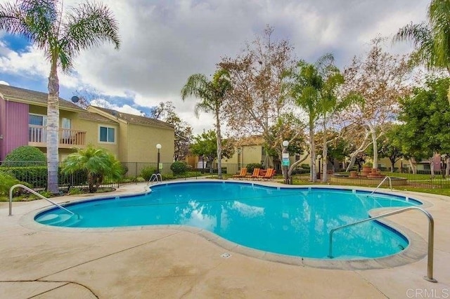 view of pool featuring a patio