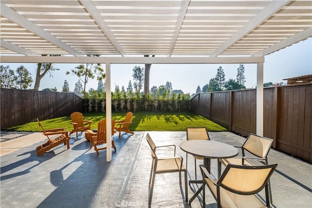 view of patio with a fenced backyard, outdoor dining area, and a pergola