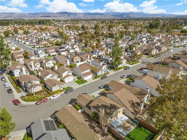 aerial view featuring a mountain view and a residential view