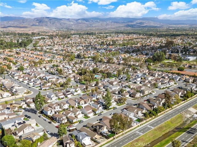 drone / aerial view with a residential view and a mountain view