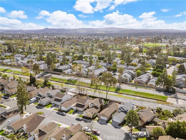 bird's eye view featuring a mountain view and a residential view