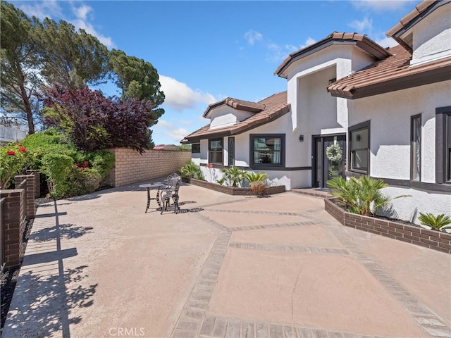 view of patio with fence