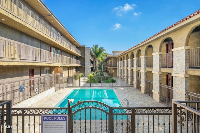 view of pool with a patio