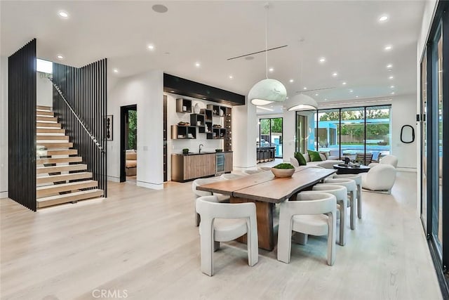 dining room with light hardwood / wood-style floors