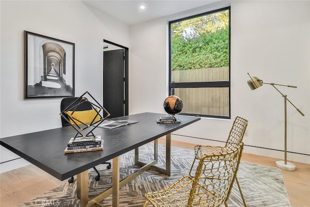 home office featuring hardwood / wood-style flooring