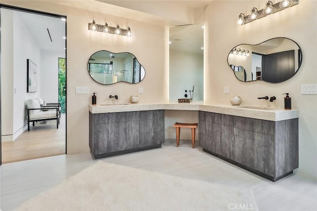 bathroom featuring vanity and hardwood / wood-style floors